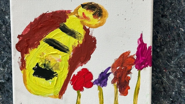 Bild einer Biene auf einer Wiese